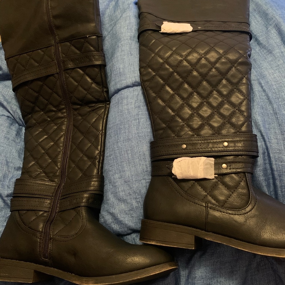 Over the knee black riding boots